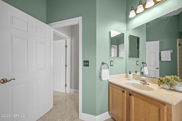 13759 Wingfield Pl, Jacksonville, FL 32224 - bathroom with vanity, tile patterned floors, and baseboards