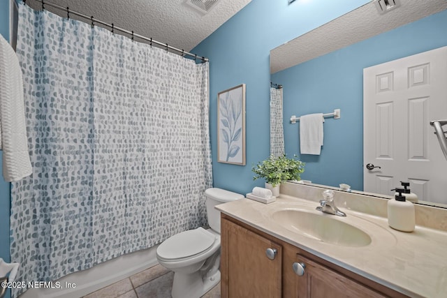 13759 Wingfield Pl, Jacksonville, FL 32224 - bathroom featuring a textured ceiling, vanity, toilet, tile patterned flooring, and shower / tub combo