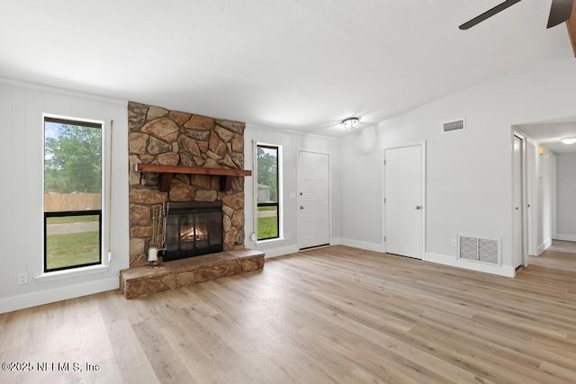 1169 Tumbleweed Dr, Orange Park, FL 32065 - unfurnished living room featuring plenty of natural light, wood finished floors, and baseboards