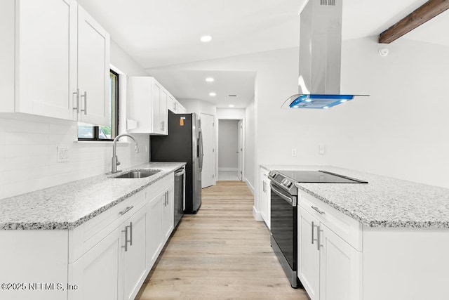 1169 Tumbleweed Dr, Orange Park, FL 32065 - kitchen with appliances with stainless steel finishes, island exhaust hood, a sink, light wood-type flooring, and white cabinetry