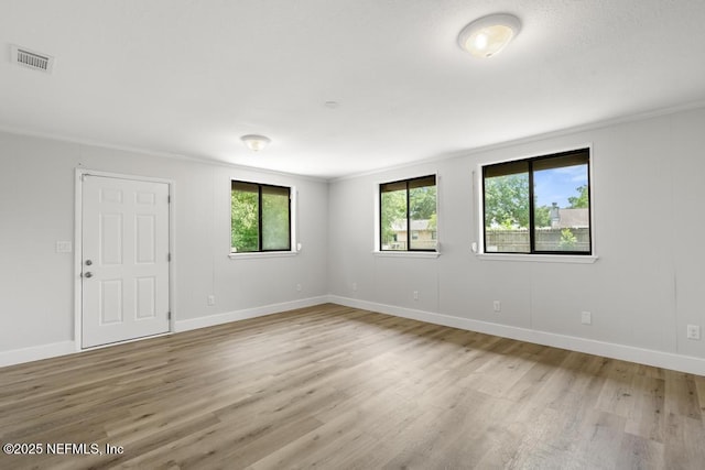 1169 Tumbleweed Dr, Orange Park, FL 32065 - spare room featuring light wood-style floors and baseboards