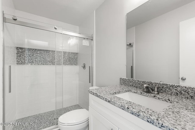 1169 Tumbleweed Dr, Orange Park, FL 32065 - full bathroom with toilet, a shower stall, and vanity