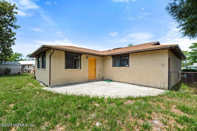 1169 Tumbleweed Dr, Orange Park, FL 32065 - rear view of property with a patio and stucco siding