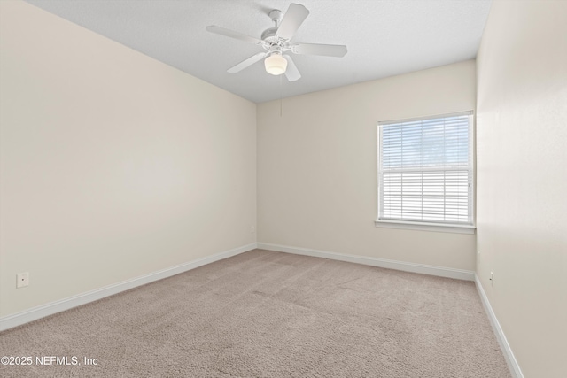 100 Bermuda Bay Cir Unit 104, Ponte Vedra Beach, FL 32082 - spare room with light carpet, baseboards, and a ceiling fan