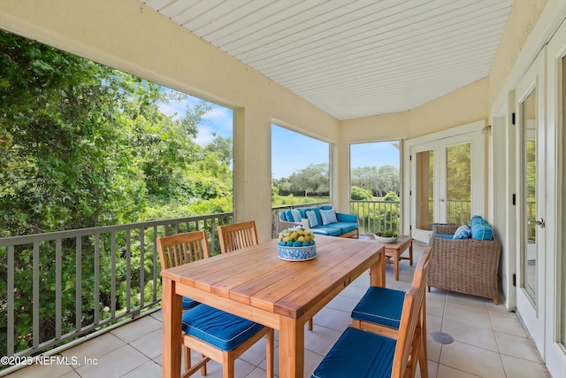 100 Bermuda Bay Cir Unit 104, Ponte Vedra Beach, FL 32082 - sunroom / solarium with french doors, outdoor lounge area, and tile patterned flooring