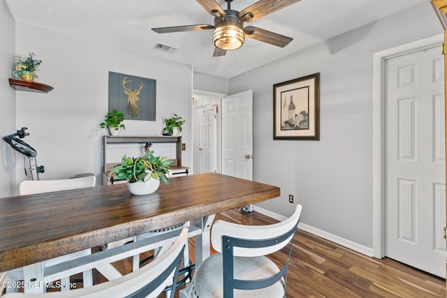 15 Ponte Vedra Ct Unit C, Ponte Vedra Beach, FL 32082 - dining room with baseboards, ceiling fan, wood finished floors, and a textured ceiling