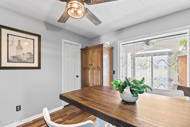 15 Ponte Vedra Ct Unit C, Ponte Vedra Beach, FL 32082 - dining room featuring ceiling fan, baseboards, wood finished floors, and a textured ceiling