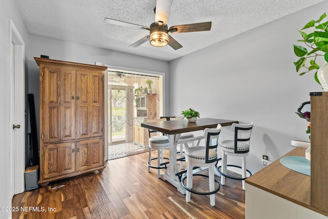 15 Ponte Vedra Ct Unit C, Ponte Vedra Beach, FL 32082 - dining space with ceiling fan, dark wood-style flooring, and a textured ceiling