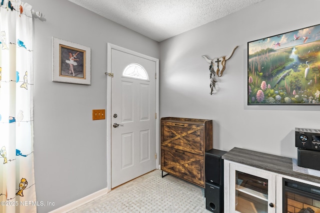 15 Ponte Vedra Ct Unit C, Ponte Vedra Beach, FL 32082 - foyer with a textured ceiling and light flooring