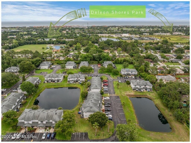 15 Ponte Vedra Ct Unit C, Ponte Vedra Beach, FL 32082 - aerial view of property and surrounding area featuring a large body of water and nearby suburban area