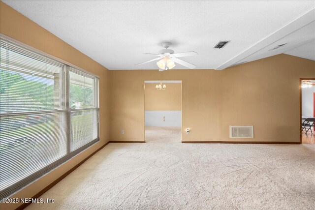 905 Ridgeway Ct, Orange Park, FL 32065 - carpeted spare room featuring baseboards, a chandelier, ceiling fan, and lofted ceiling