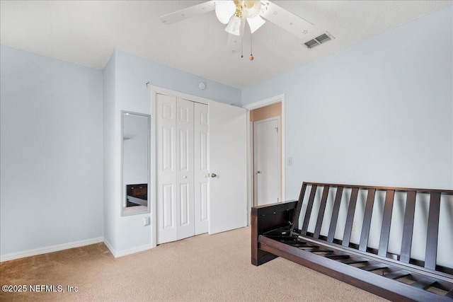 905 Ridgeway Ct, Orange Park, FL 32065 - bedroom featuring carpet, a closet, baseboards, and ceiling fan
