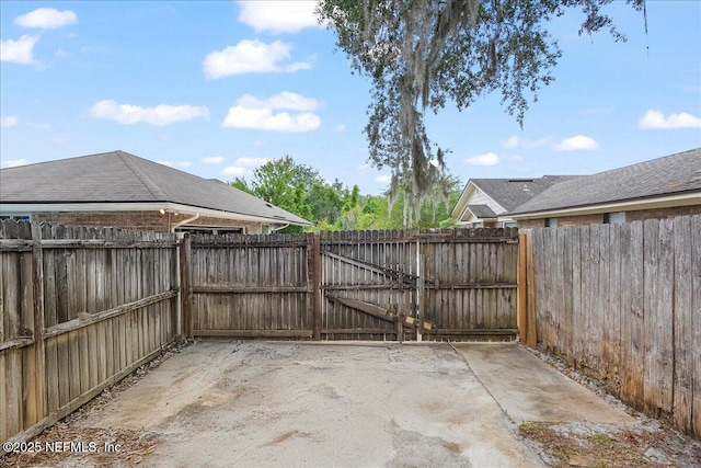 905 Ridgeway Ct, Orange Park, FL 32065 - fenced backyard with a patio area and a gate