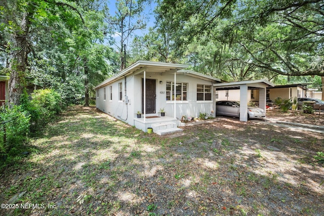 4357 Trenton Dr S, Jacksonville, FL 32209 - back of house with an attached carport