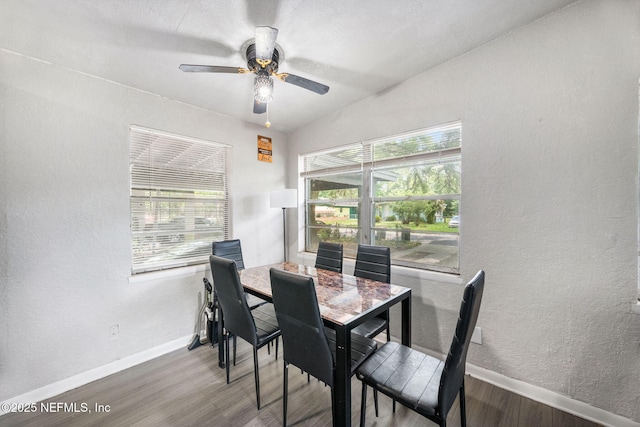 4357 Trenton Dr S, Jacksonville, FL 32209 - dining space with wood finished floors, baseboards, a textured wall, ceiling fan, and lofted ceiling