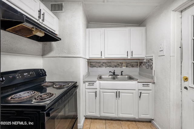 4357 Trenton Dr S, Jacksonville, FL 32209 - kitchen featuring black electric range oven, a sink, under cabinet range hood, ornamental molding, and white cabinets