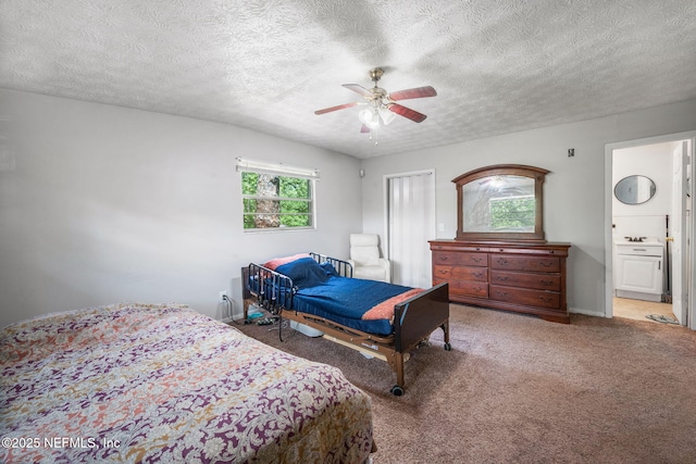 4357 Trenton Dr S, Jacksonville, FL 32209 - carpeted bedroom featuring a textured ceiling and ceiling fan