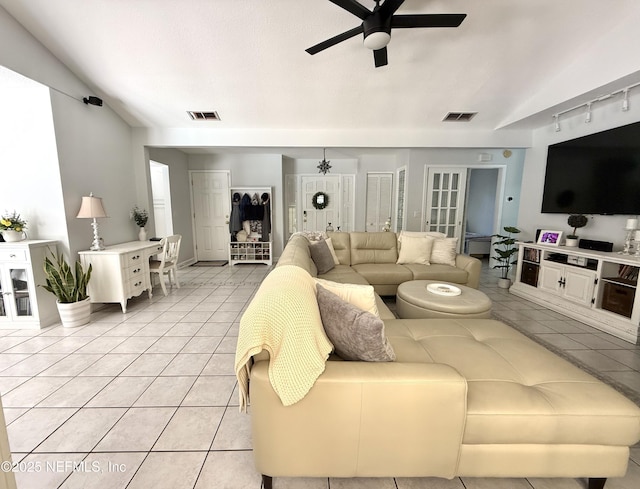12753 Burning Tree Ln W, Jacksonville, FL 32223 - living area with a ceiling fan, light tile patterned floors, and rail lighting