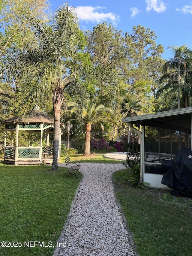 12753 Burning Tree Ln W, Jacksonville, FL 32223 - view of green lawn featuring a gazebo and a sunroom