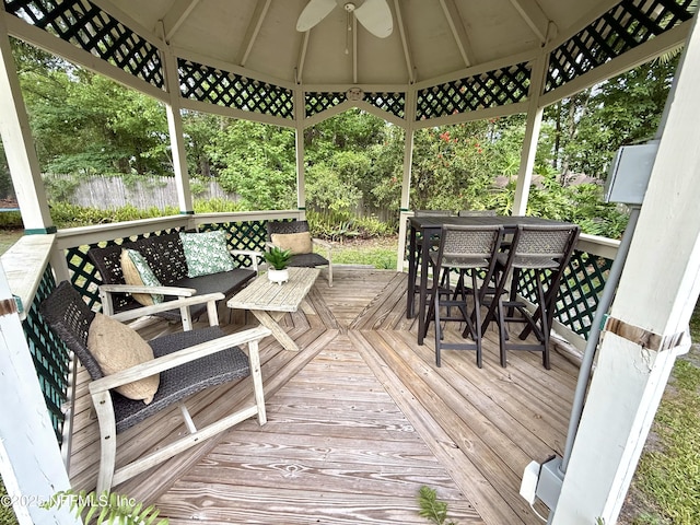 12753 Burning Tree Ln W, Jacksonville, FL 32223 - wooden deck featuring a gazebo, ceiling fan, and outdoor dining space