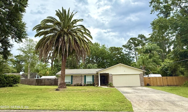 12753 Burning Tree Ln W, Jacksonville, FL 32223 - single story home featuring an attached garage, concrete driveway, and brick siding