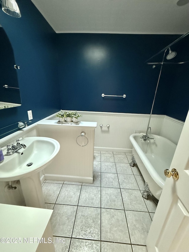12753 Burning Tree Ln W, Jacksonville, FL 32223 - bathroom with a soaking tub, wainscoting, tile patterned floors, a shower, and baseboards