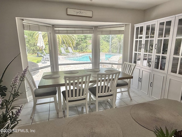 12753 Burning Tree Ln W, Jacksonville, FL 32223 - dining room with plenty of natural light and light tile patterned floors