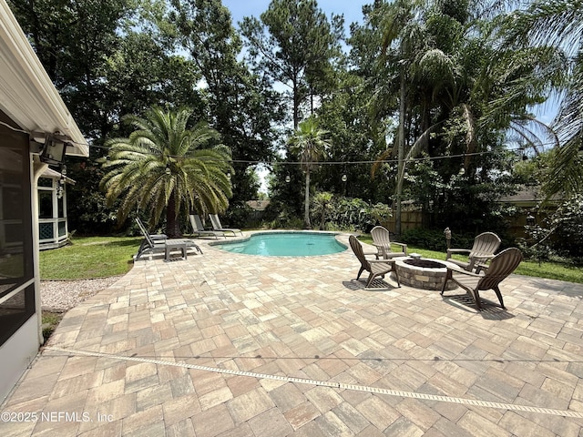 12753 Burning Tree Ln W, Jacksonville, FL 32223 - swimming pool featuring a patio and a fire pit