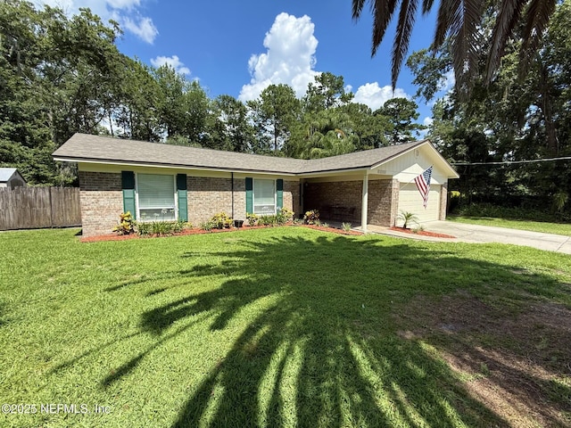12753 Burning Tree Ln W, Jacksonville, FL 32223 - ranch-style home featuring an attached garage, brick siding, and concrete driveway
