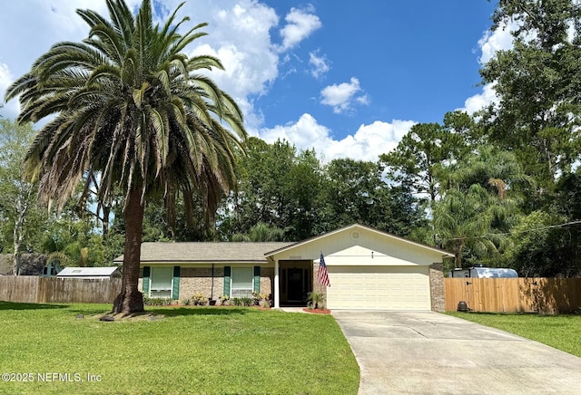 12753 Burning Tree Ln W, Jacksonville, FL 32223 - ranch-style house featuring a garage, concrete driveway, and brick siding
