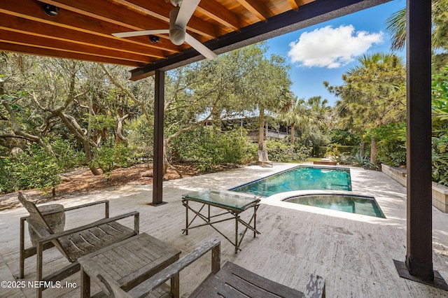 1927 Beachside Ct, Atlantic Beach, FL 32233 - outdoor pool with an in-ground hot tub, a ceiling fan, a patio area, and view of scattered trees