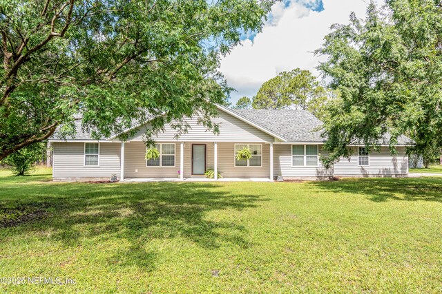 6645 Elvin Starling Rd, Macclenny, FL 32063 - ranch-style home featuring a front lawn and roof with shingles