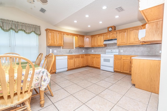 6645 Elvin Starling Rd, Macclenny, FL 32063 - kitchen featuring white appliances, under cabinet range hood, a sink, light tile patterned floors, and recessed lighting