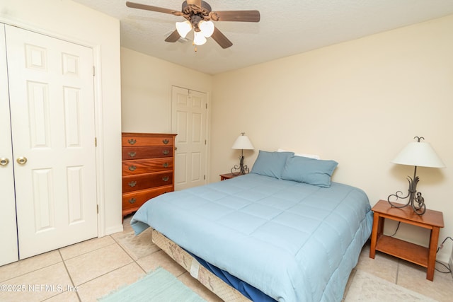 6645 Elvin Starling Rd, Macclenny, FL 32063 - tiled bedroom featuring a textured ceiling and ceiling fan
