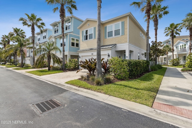 2695 Morning Light Ct, Flagler Beach, FL 32136 - view of front of home with a residential view and driveway
