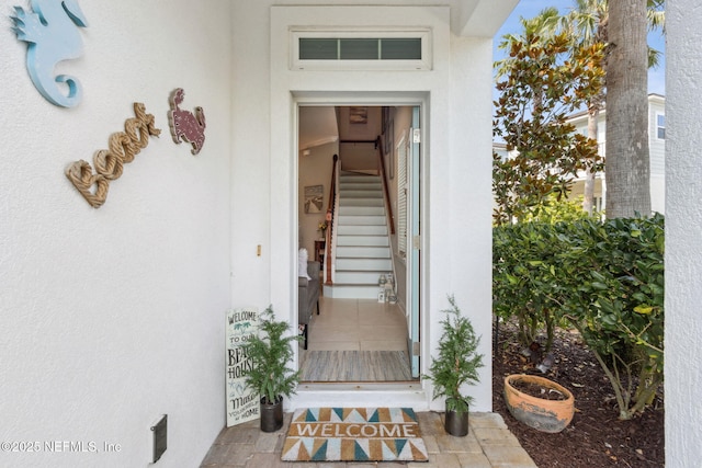 2695 Morning Light Ct, Flagler Beach, FL 32136 - property entrance with stucco siding