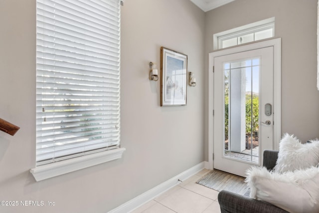 2695 Morning Light Ct, Flagler Beach, FL 32136 - foyer entrance with light tile patterned flooring and baseboards