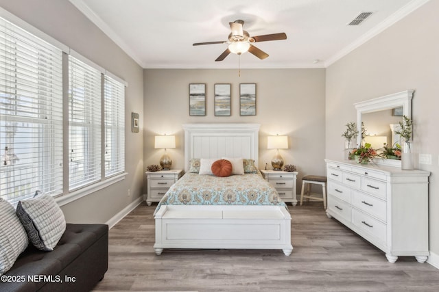2695 Morning Light Ct, Flagler Beach, FL 32136 - bedroom featuring light wood finished floors, ornamental molding, baseboards, and ceiling fan