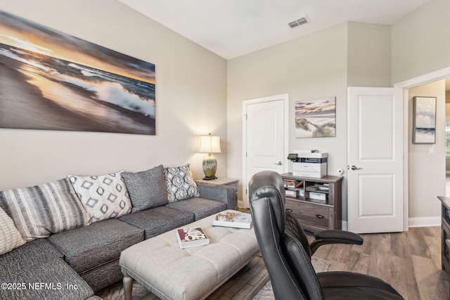 2695 Morning Light Ct, Flagler Beach, FL 32136 - living area featuring wood finished floors
