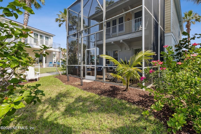 2695 Morning Light Ct, Flagler Beach, FL 32136 - rear view of house with glass enclosure
