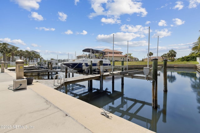 2695 Morning Light Ct, Flagler Beach, FL 32136 - dock featuring boat lift and a water view