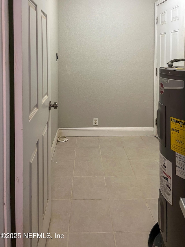 4522 Kingsbury St, Jacksonville, FL 32205 - tiled spare room with electric water heater and baseboards