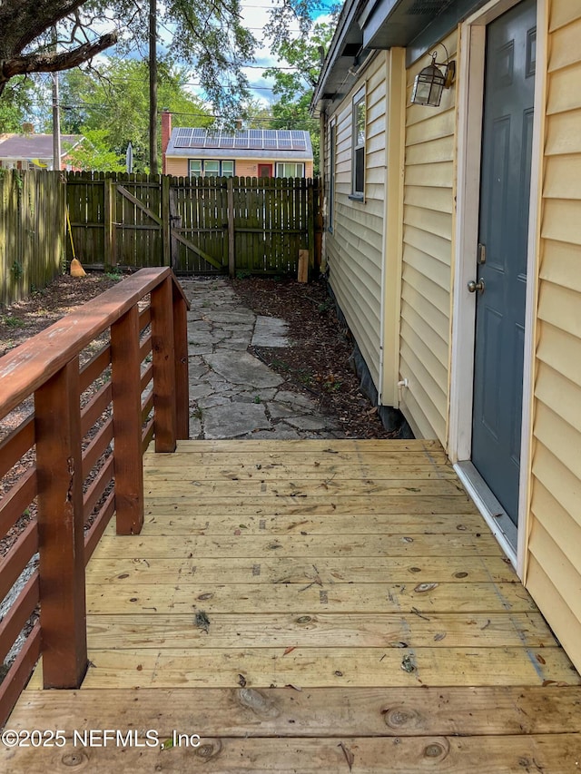4522 Kingsbury St, Jacksonville, FL 32205 - wooden terrace with a fenced backyard