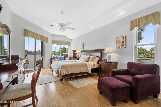12 Collingville Ct, Palm Coast, FL 32137 - bedroom with light wood-style flooring, access to exterior, recessed lighting, and ceiling fan