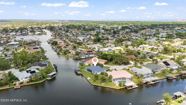 12 Collingville Ct, Palm Coast, FL 32137 - aerial perspective of suburban area with a nearby body of water
