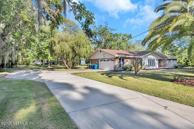 10859 Windy Gale Dr W, Jacksonville, FL 32218 - single story home with an attached garage, a front lawn, and driveway