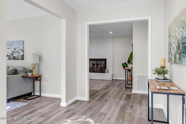 10859 Windy Gale Dr W, Jacksonville, FL 32218 - hall featuring wood finished floors and baseboards