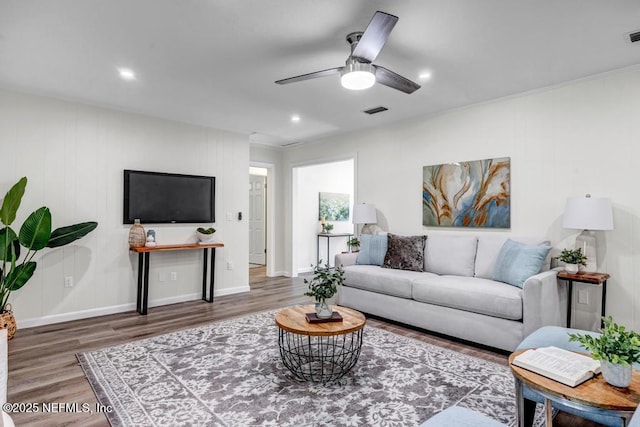 10859 Windy Gale Dr W, Jacksonville, FL 32218 - living room featuring wood finished floors, a ceiling fan, recessed lighting, and baseboards