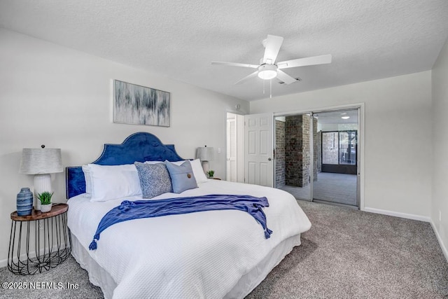 10859 Windy Gale Dr W, Jacksonville, FL 32218 - bedroom with carpet, baseboards, access to exterior, a ceiling fan, and a textured ceiling