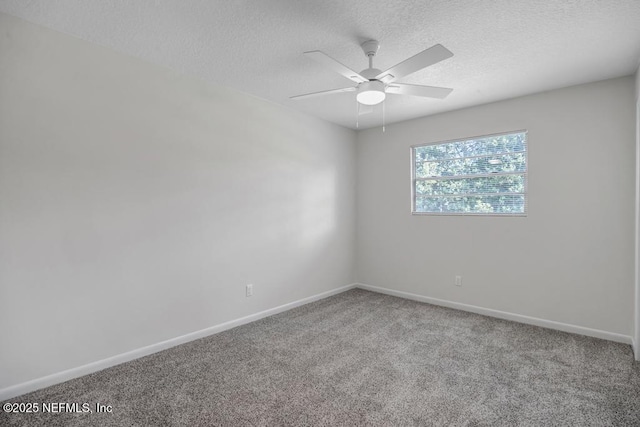 10859 Windy Gale Dr W, Jacksonville, FL 32218 - unfurnished room with carpet flooring, a textured ceiling, a ceiling fan, and baseboards